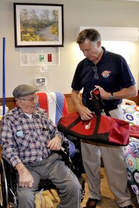 Perry with Robert Metzler, who fought with General Patton at the Battle of the Bulge, at the Fresno Veterans Administration "No Veteran Dies Alone Program."